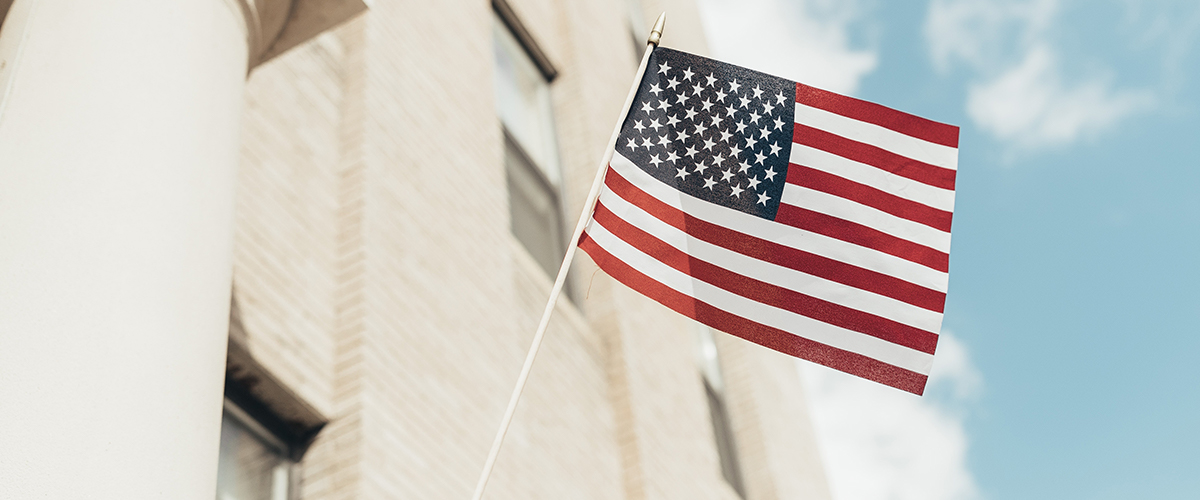 White Brick wall with USA Flag